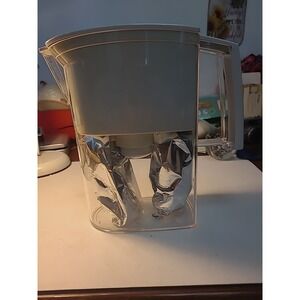 Pur Water Filter And 2 Filters Still In The Packaging